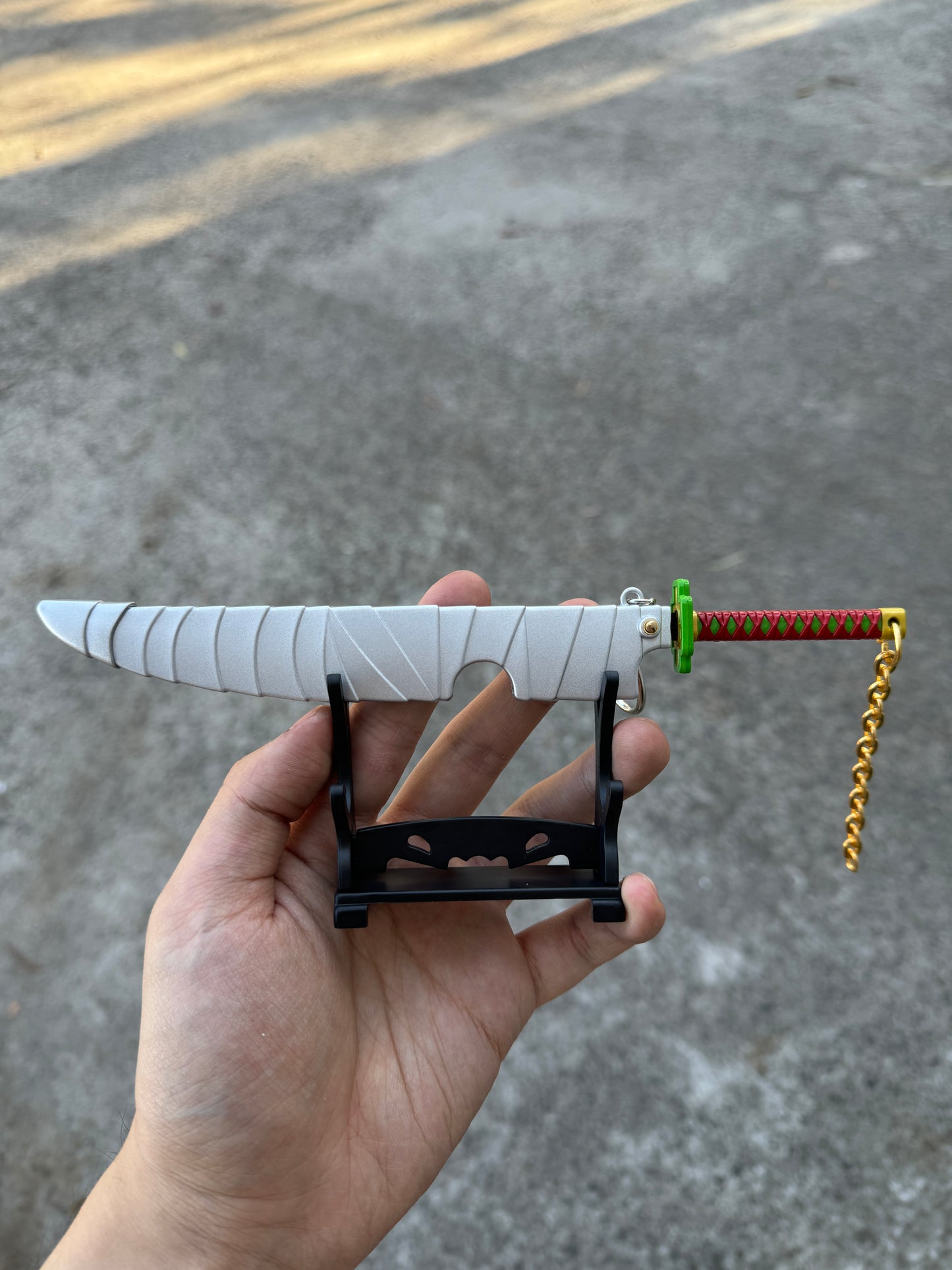 DEMON SLAYER – TENGEN UZUI’S NICHIRIN CLEAVER KEYCHAIN